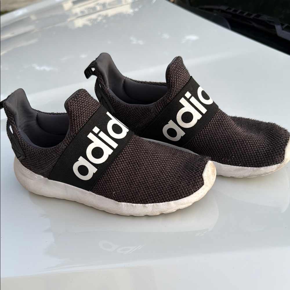 Adidas Black and White Slip-On Sneakers